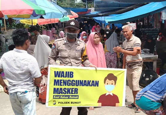 Polsek Bunut Patroli Cegah Kriminalitas dan Sosialisasi Prokes di Pasar Tradisional