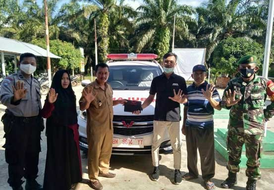 Babinsa Koramil 16/Tapung Hadiri Penyerahan Bantuan Mobil Ambulance Desa Rimba Makmur