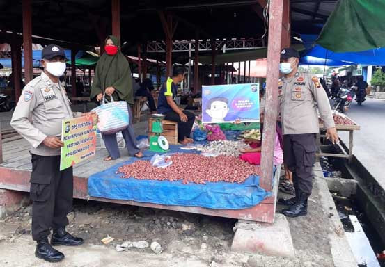 Cegah Covid-19, Polsek Kuala Kampar Imbau Masyarakat Patuhi Prokes