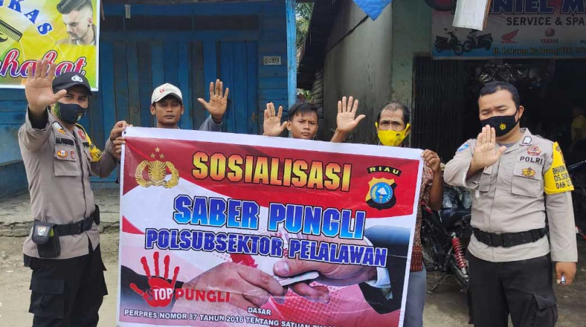 Cegah Pungutan Liar, Polsubsektor Pelalawan Sosialisasikan Saber Pungli