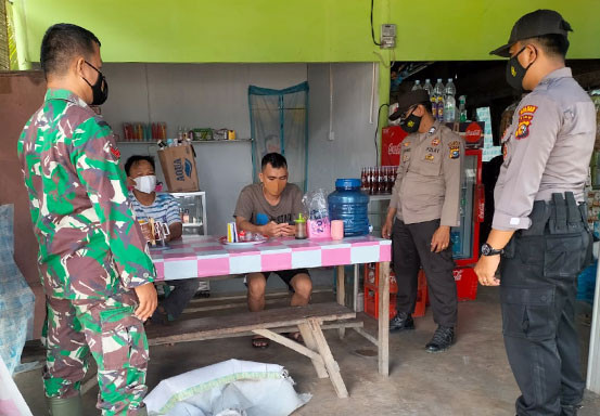 Polisi dan TNI Gelar Operasi Yustisi Prokes di Kecamatan Pangkalan Lesung