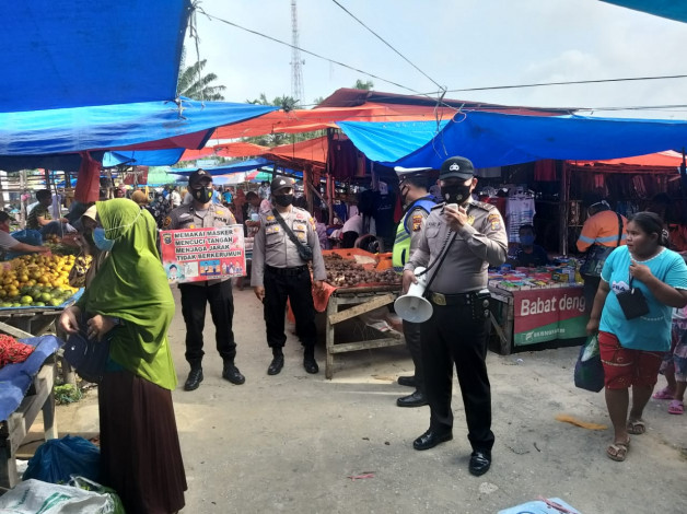 Polsek Bandar Sei Kijang Lakukan Operasi Yustisi Prokes di Pasar Tradisional