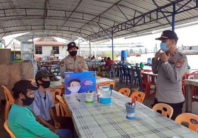 Polsek Kuala Kampar Ajak Warga Tetap Terapkan Protokol Kesehatan di Masa Pandemi Covid-19