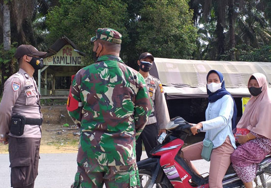 Polsek Kerumutan Gelar Operasi Yustisi untuk Pantau Kepatuhan Prokes Warga