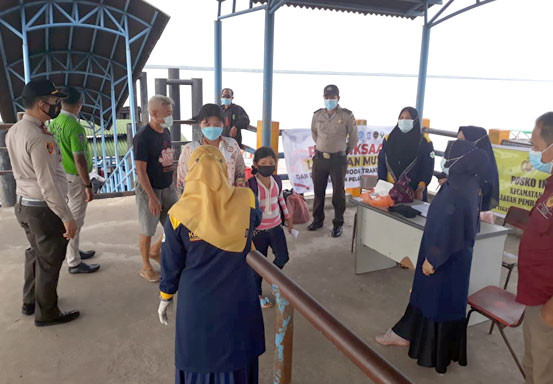 Polsek Kuala Kampar Perketat Pengawasan PPKM di Pelabuhan Penyalai Teluk Dalam