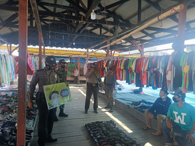 Polsek Kuala Kampar Himbau Masyarakat di Pasar Patuhi Prokes