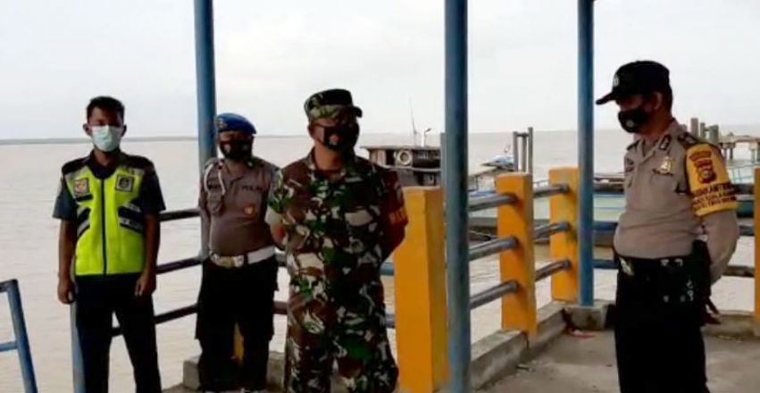 Polsek Kuala Kampar Pantau Penerapan Prokes Warga di Pelabuhan