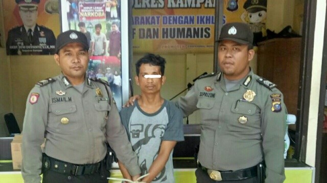 Hajar Polisi, Pria Ini Ditangkap Polsek Perhentian Raja