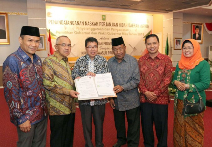 Gubri Teken NPHD, KPU Riau Terima Rp324 M dan Bawaslu Rp84 M