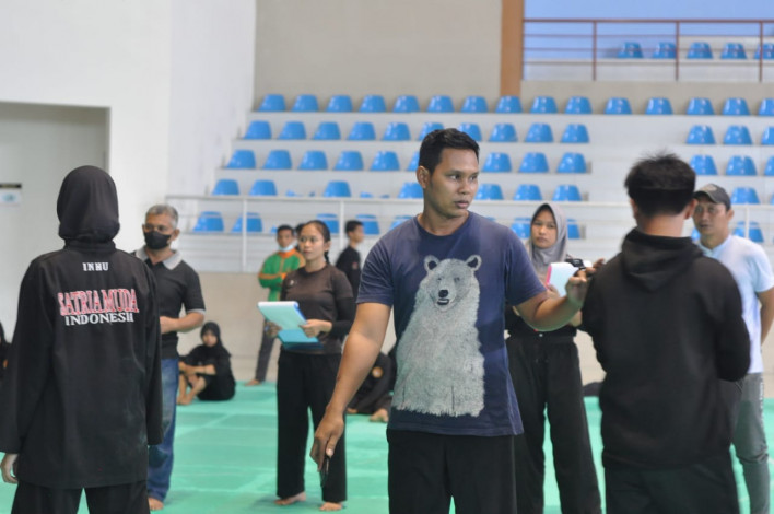 Segudang Prestasi, PNS di Siak Ini Jadi Pelatih Tim Silat Riau