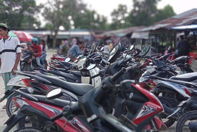 Tarif Parkir Motor di Pasar Tradisional Pekanbaru Turun Rp1.000