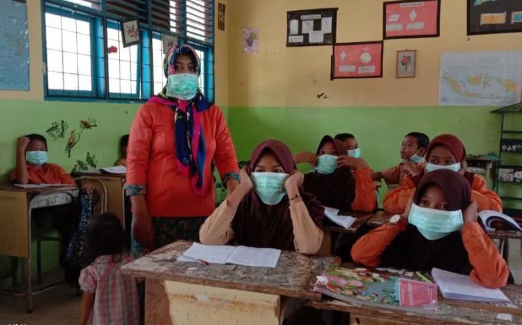 Dinas Kesehatan Bengkalis Bagikan 6.000 Masker
