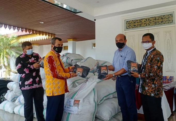 PT RAPP Kembali Sarahkan Bantuan Masker ke Pemprov Riau, Total Sudah 400 Ribu