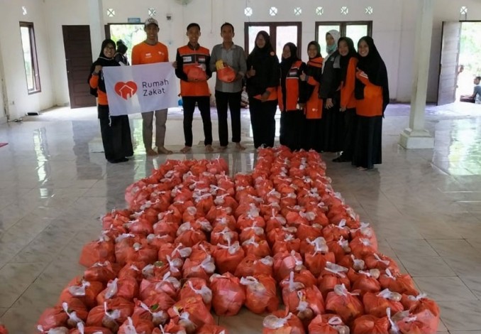 Relawan Nusantara RZ Pekanbaru Salurkan Bantuan untuk Warga Terdampak Banjir di Tanjung Balam