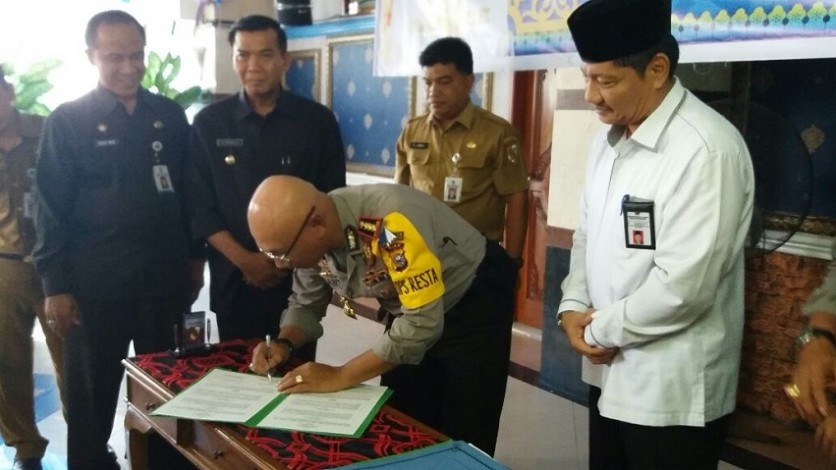 Polresta dan Pemko Pekanbaru Teken MoU Pembinaan Pelajar Beprestasi untuk Jadi Polisi