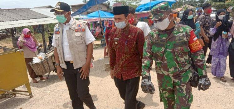 Sidak Pasar, Pjs Bupati Rohil Temukan Banyak Pedagang Tak Pakai Masker