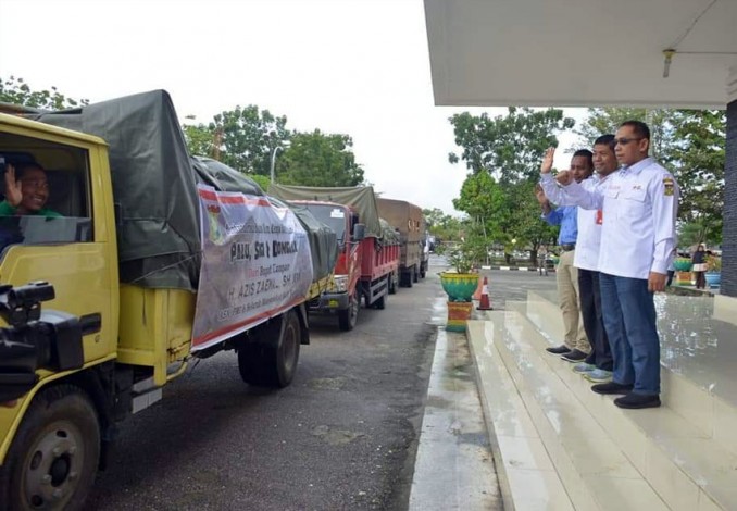 Bupati Kampar Salurkan Bantuan untuk Korban Bencana di Palu, Sigi dan Donggala
