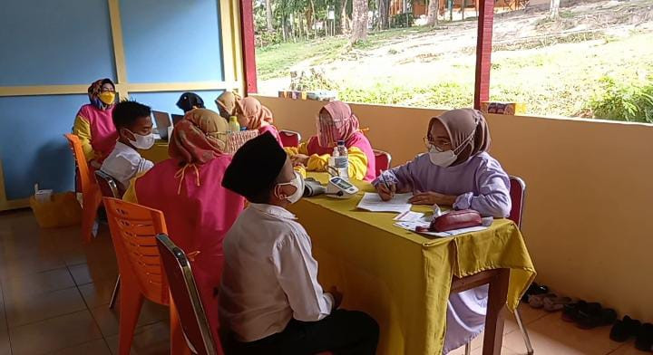 BIN Daerah Riau Lanjutkan Vaksinasi Dosis Kedua Bagi 1.500 Santri dan Warga