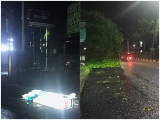 Dampak Hujan Deras Landa Pekanbaru, Pohon hingga Banner Bank Bertumbangan