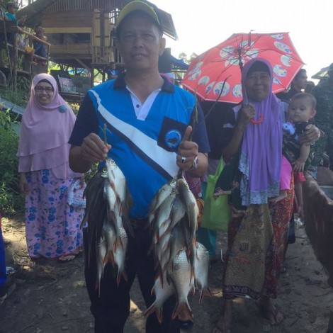 Ribuan Masyarakat Panen 1,5 Ton Ikan di Rantau Larangan Sibiruang